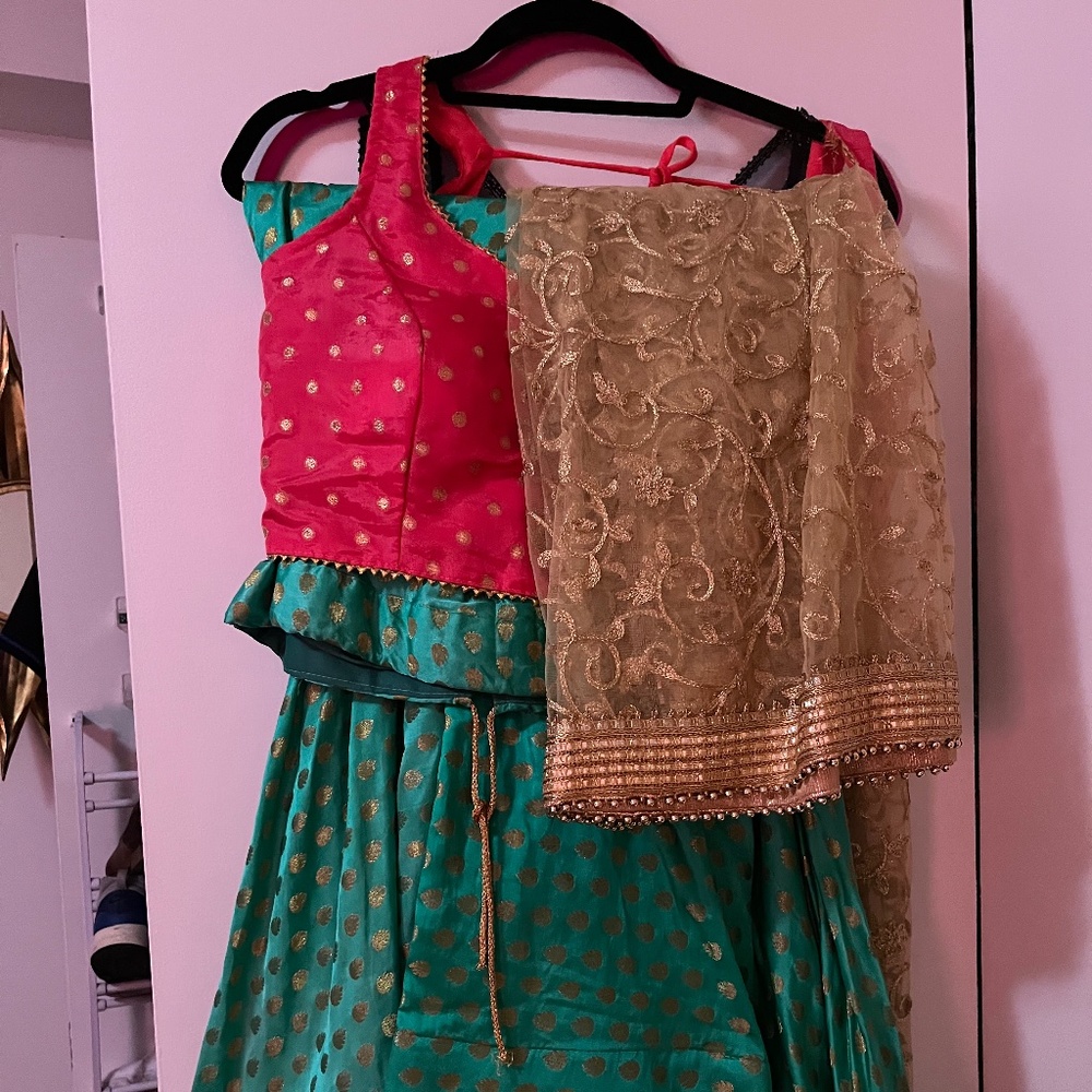 Bright teal and pink lengha